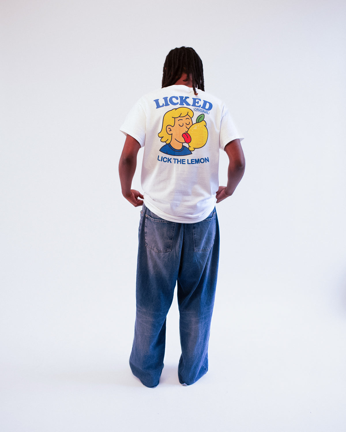 The original Lick the Lemon T-shirt, worn with blue jeans